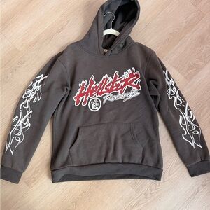 Black Graphic Pullover Hoodie with White Sleeve Graphics - Women's Jacket & Coat